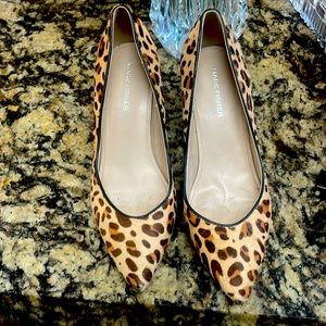 Calf hair leopard print heels.